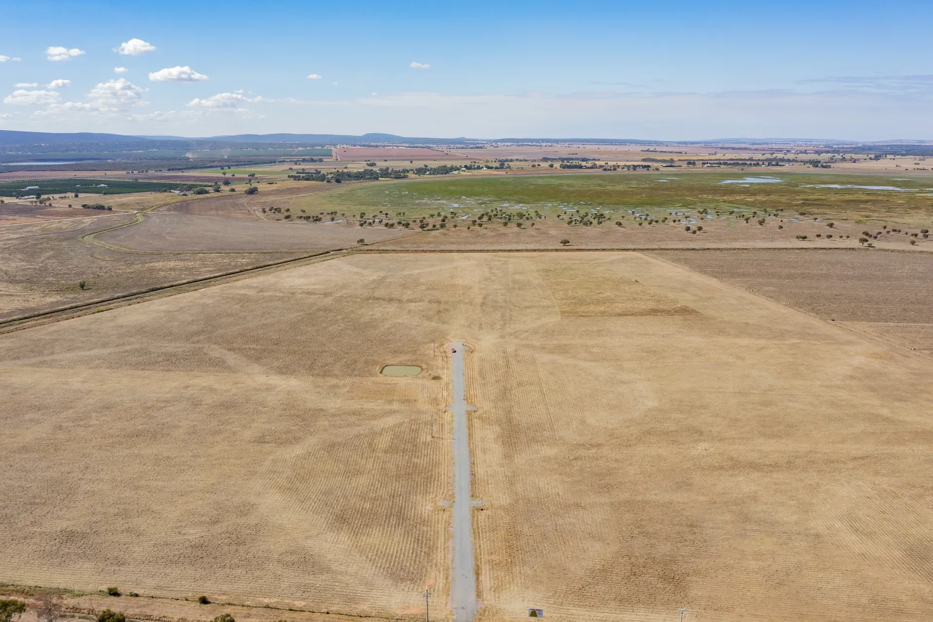 Wide aerial of Riverina farmland surrounding Leeton Rise